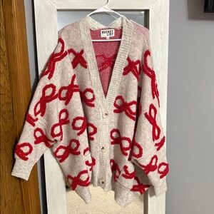 Oversized red and gray bow sweater